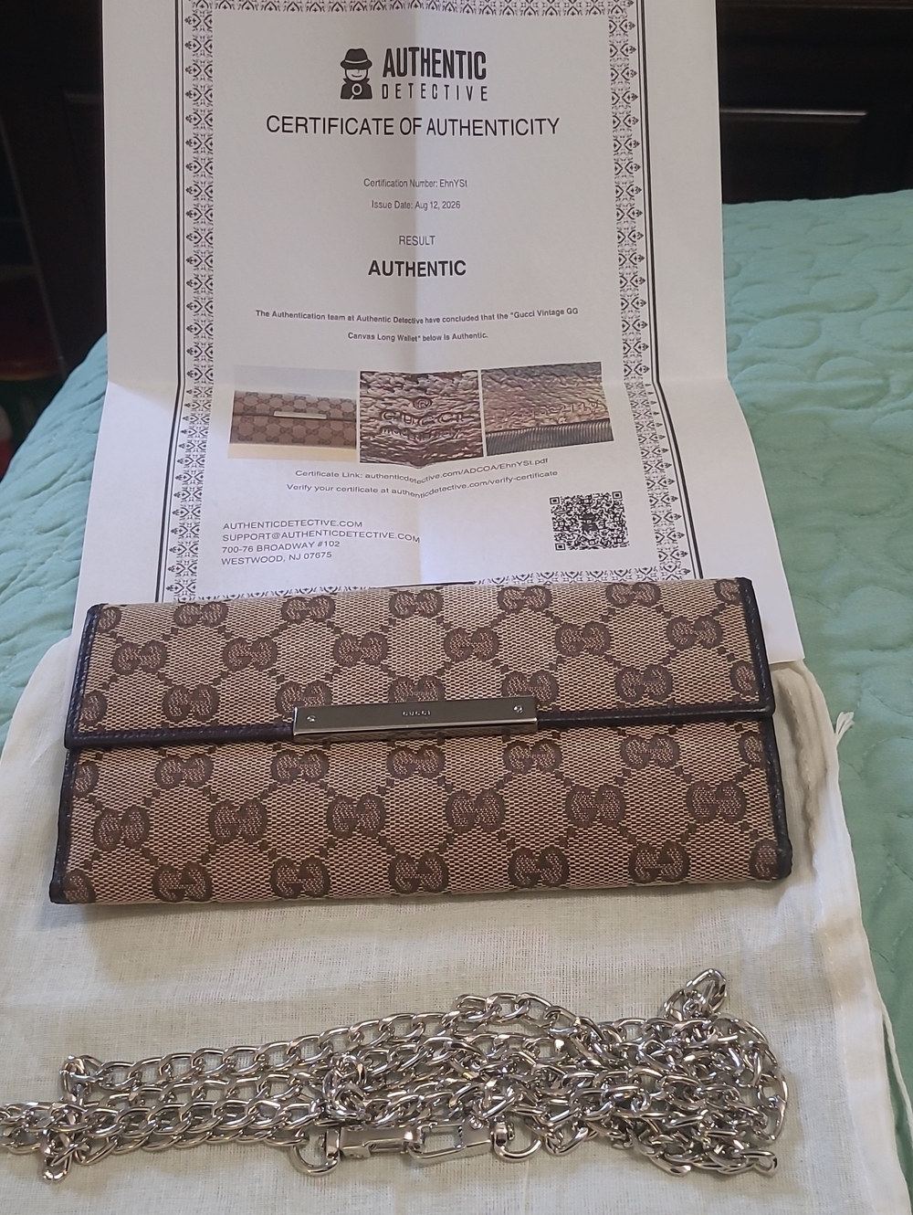 Gucci Continental Canvas Wallet.